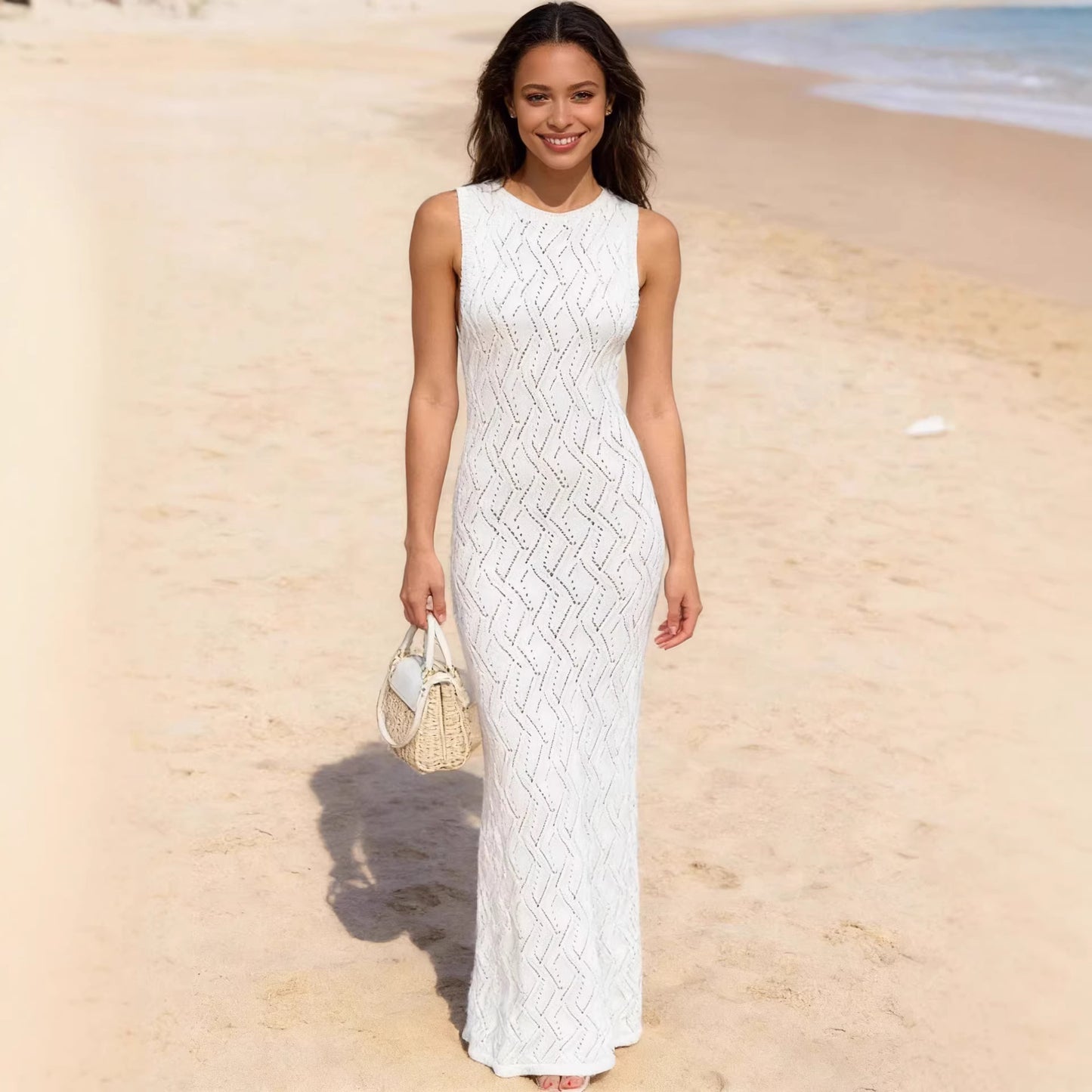 Solid Color Cutout Figure Hugging Knit Dress With A Round Neck And No Sleeves