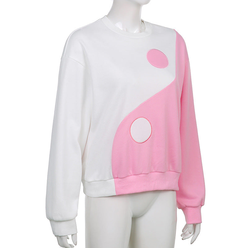 Dame patchwork-sweatshirt med rund hals og lange ærmer i kontrastfarver