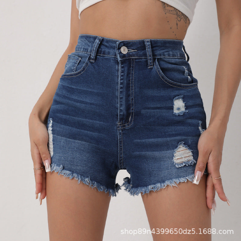 Højtaljede slim-fit denimshorts med slidte detaljer til kvinder