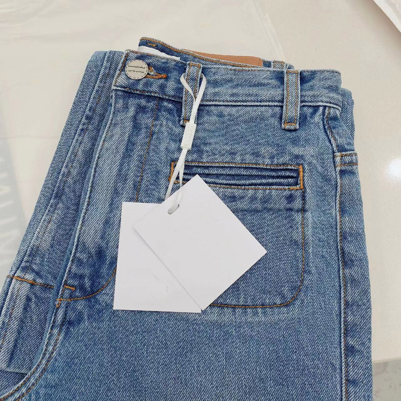 Women's Light Blue Distressed Ninth Micro Flared Jeans