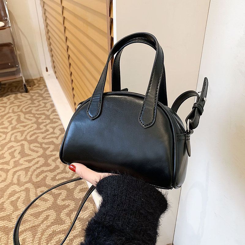 Trendy skulderhåndtaske til kvinder