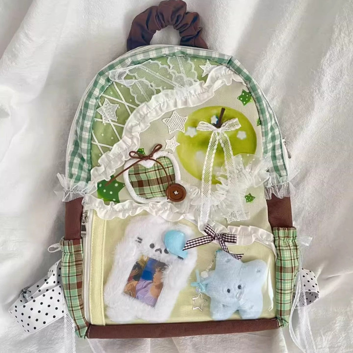 Rygsæk med stor kapacitet i skotskternet kanvas med patchwork i kontrastfarver