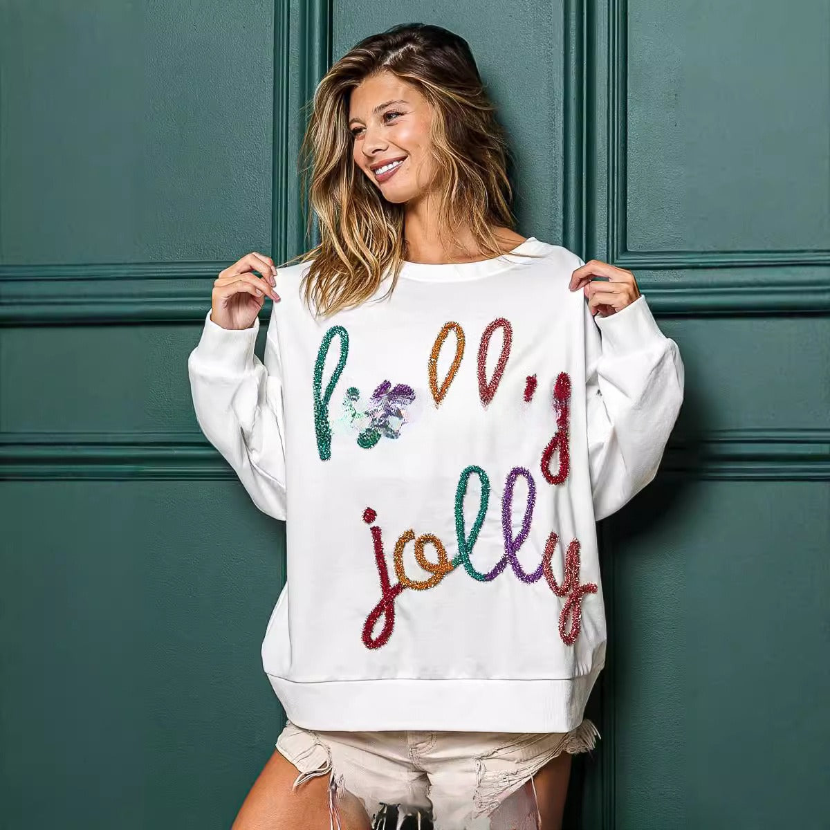 Strikket julesweater med bogstaver, rund hals, lange ærmer og løs pasform