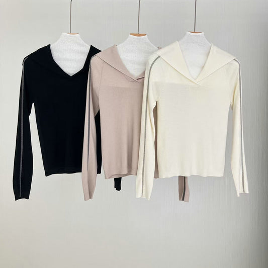 Uldsweater med stor revers og lange ærmer