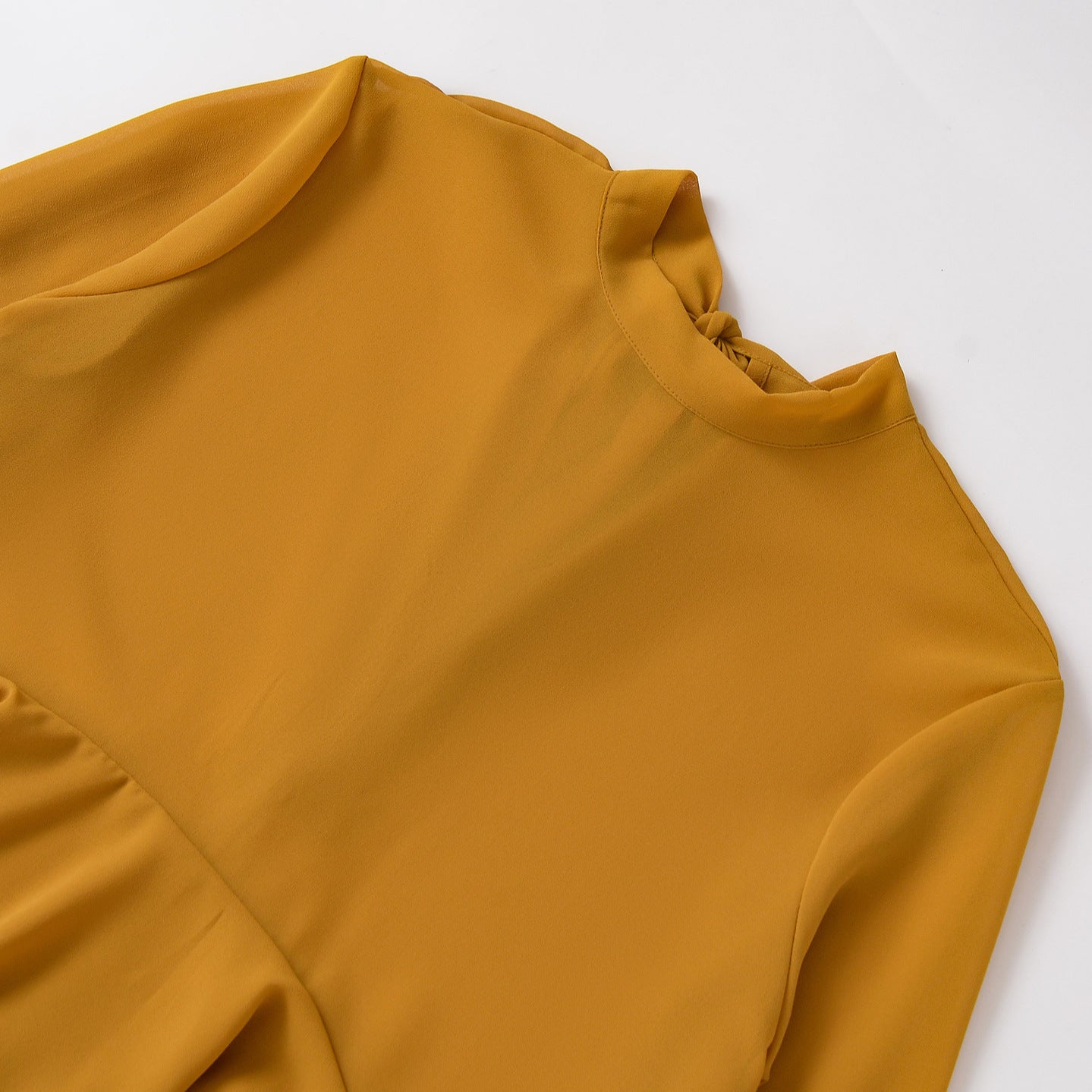 Elegant Chiffon Top With A Flowing Ruffled Hem