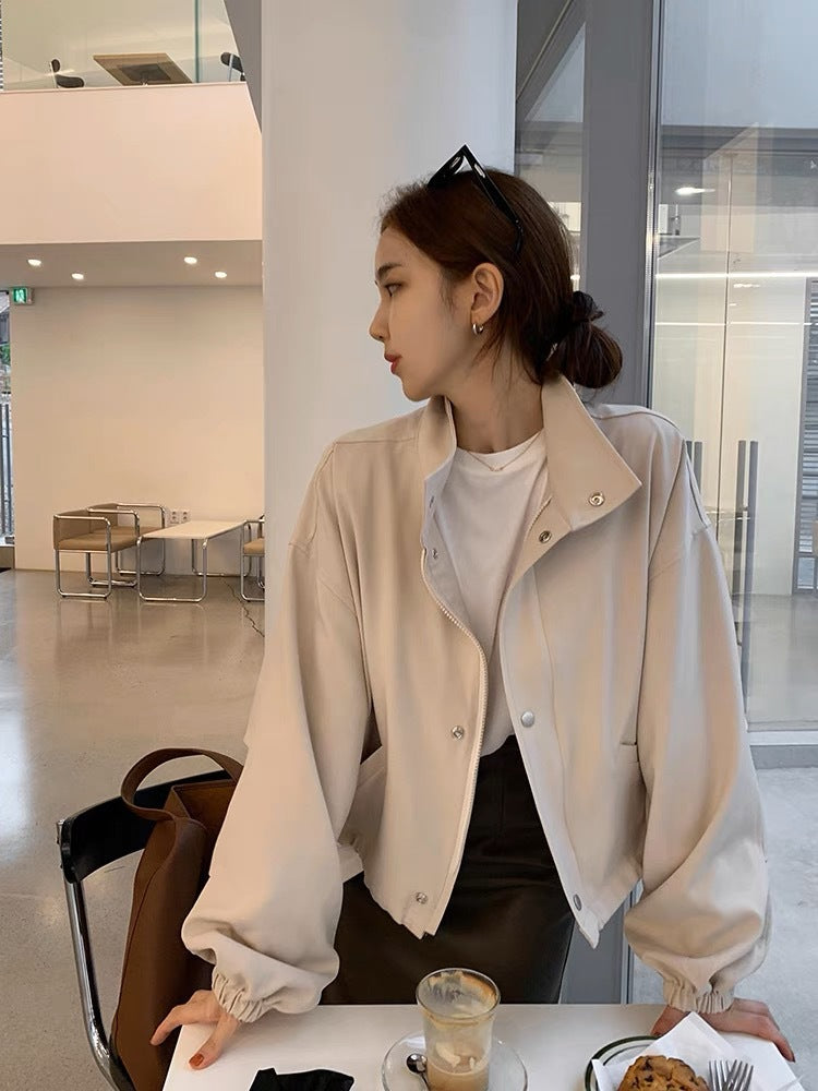 Solid Color Relaxed Fit Top With A Stand Up Collar