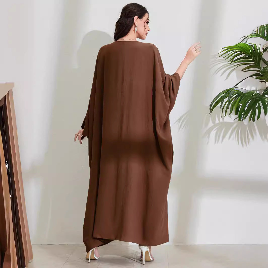 Long Dress With Tie Details Batwing Sleeves And A Round Necklinestylish And Elegant