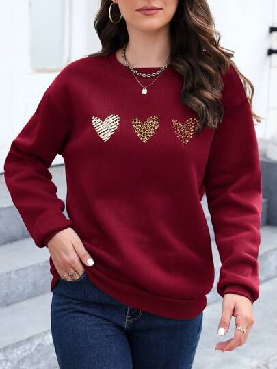 Essnce Leopard Heart Print Drop Shoulder Sweatshirt