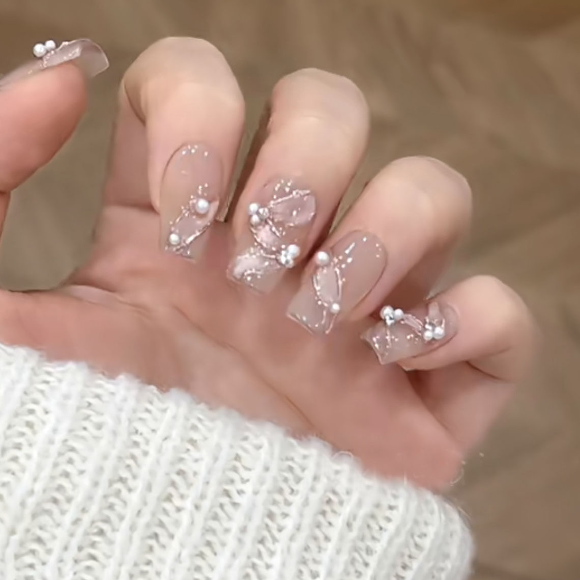 The Mermaid Princess Wears An Alligator Tail Ribbon And Has Beautiful Manicured Nails.