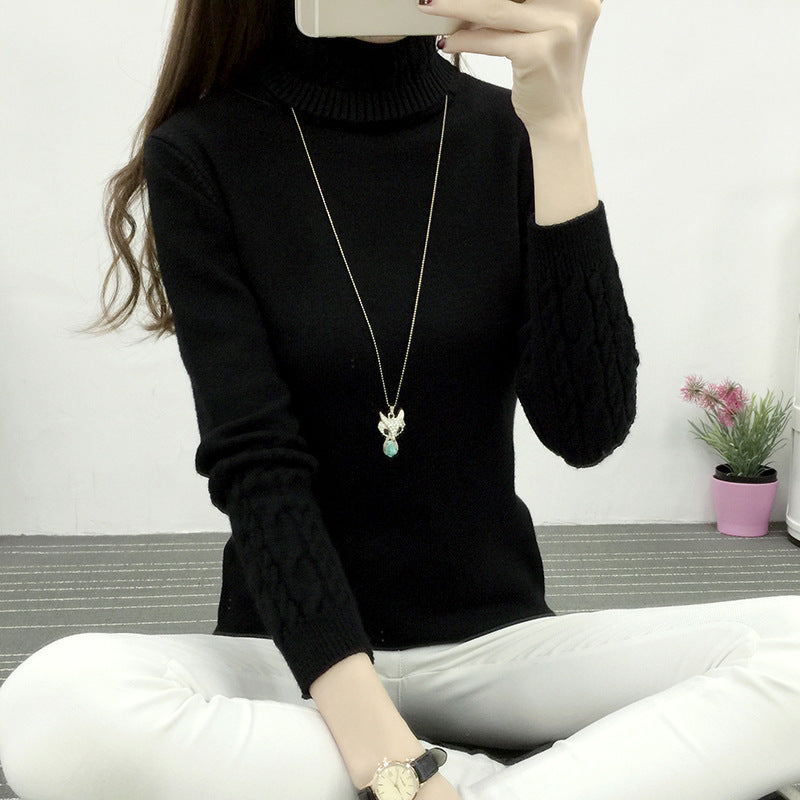 Dame rullekrave sweater fortykket