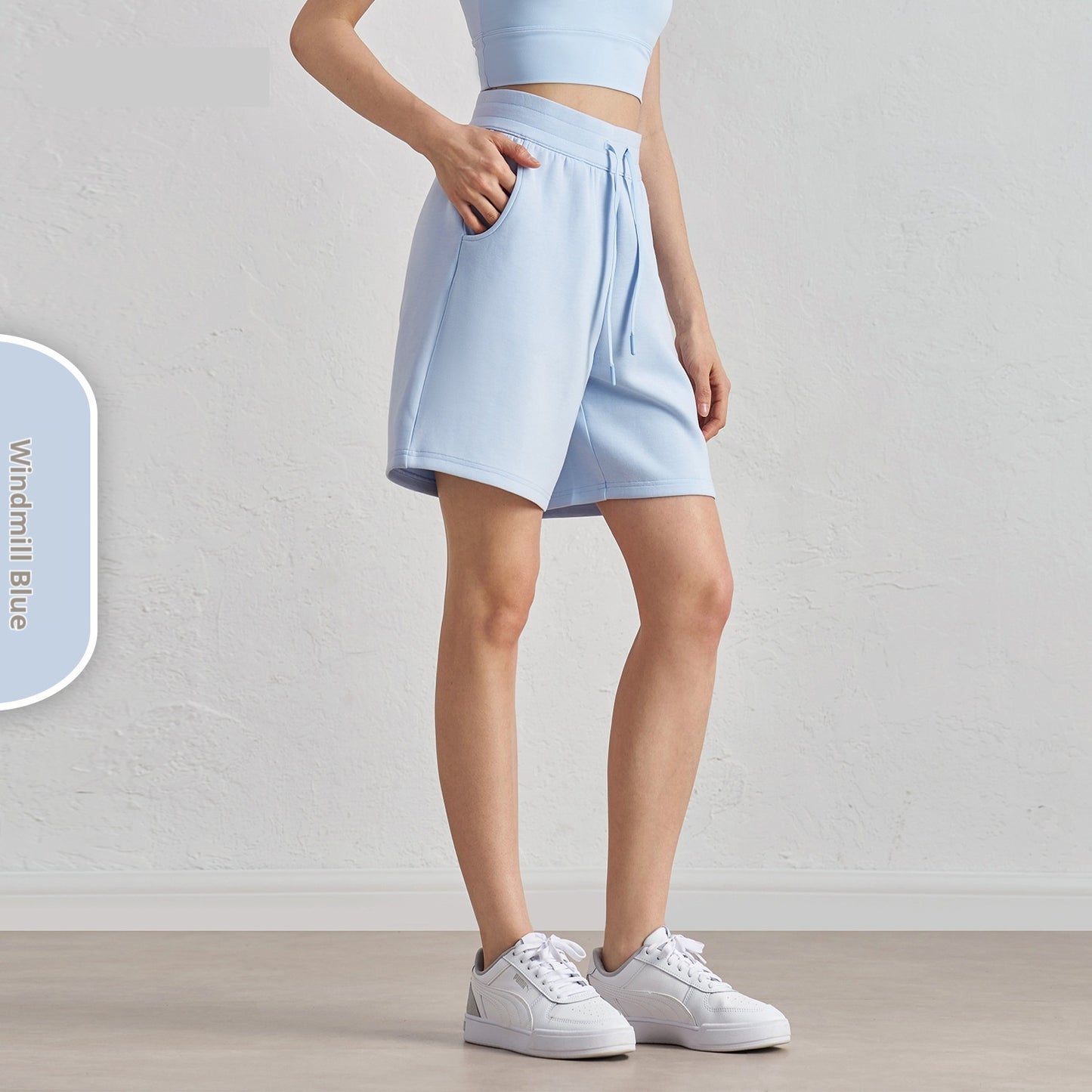 Løse løbeshorts med lagdelte, fempunkts fritidsfitnessshorts